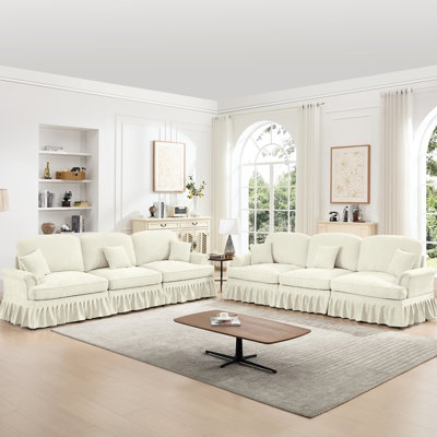 Beige blanc modulaire 2 pièces, siège 3 places +, accoudoirs évasés, jupes de plis à volants amovibles, pieds fuselés, chenille douce, coussin segmenté, coussin amovible, différents agencements pour un espace de vie classique