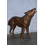 Navarrete Wolf Standing and Howling Life Size Bronze Statue - Size: 45"L x 15"W x 34"H.