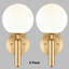 Applique murale moderne en or avec abat-jour globe en verre de lait-1869918988