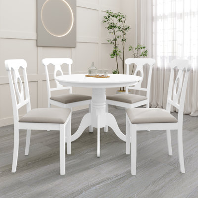 Rashika 4 - Person Pedestal Dining Set