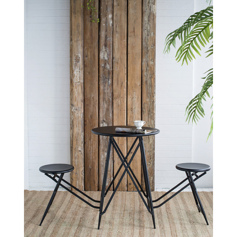 Table d'appoint et deux sièges noirs escamotables
