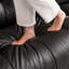 Causeuse-coussin modulable noire en cuir véritable