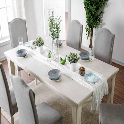 Elegant Rectangular Dining Table With Expandable Leaf In Antique White Finish