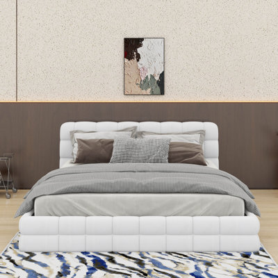 Grand lit plateforme tapissier