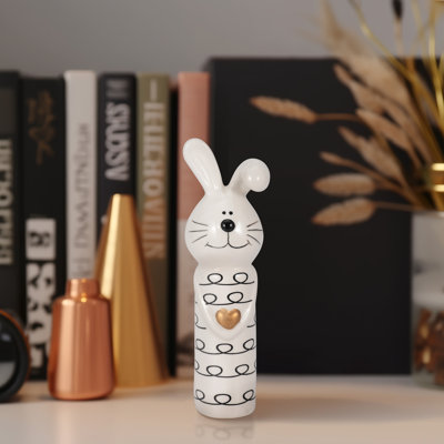 Ceramic Bunny Figurine with Heart Accent.
