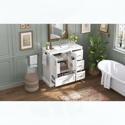 Meuble-lavabo sur pied avec lavabo en céramique, quatre tiroirs avec séparateurs amovibles, portes à fermeture en douceur avec étagères intérieures et porte-serviettes réversible, blanc