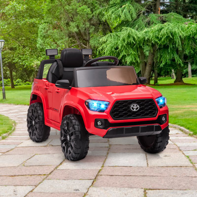 Officially Licensed Toyota Tacoma 12V Kids Ride-On Car with Remote Control – Spring Suspension, Safety Belt, Gentle Start, LED Headlights, 2 Speeds – Electric Vehicle for Ages 3-8