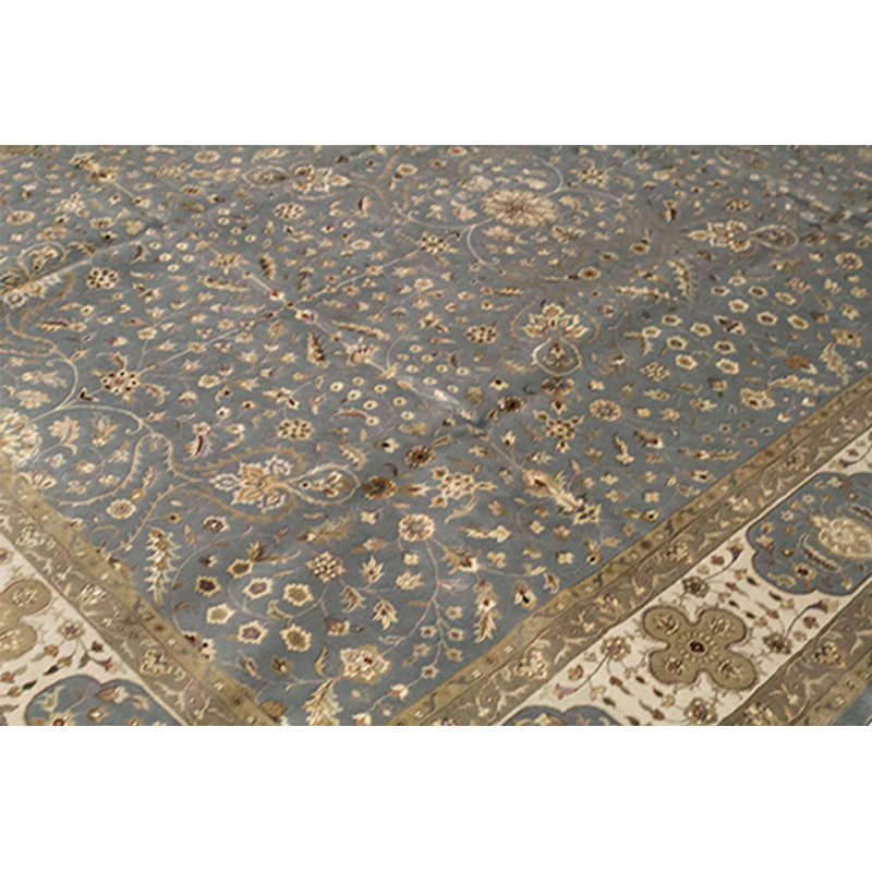 Tapis bleu et ivoire noué à la main de haute qualité