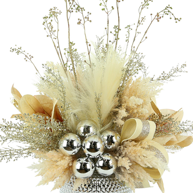 Arrangement floral de feuilles de Quesada dans un vase