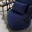 Fauteuil d'appoint confortable en lin texturé avec support en métal élégant