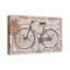 « black rétro bike on obturateur beige », impression sur toile