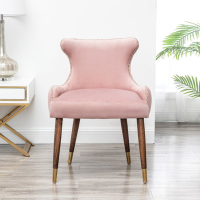 Chaise en velours rose - avec rembourrage en mousse dense, dossier incurvé, pattes noires, garniture en mousse rembourrée, revêtement en bois d'hévéa massif