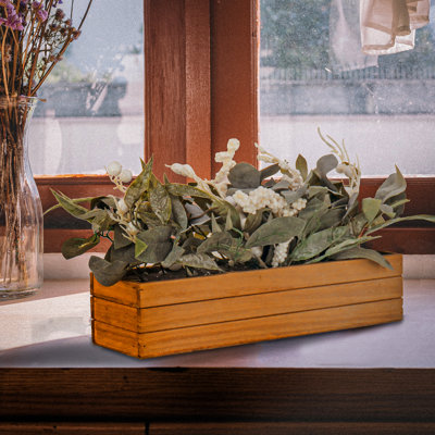 Jardinière de 56 cm avec feuillage de Noël