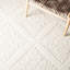 Tapis géométrique en laine tissé à la main Kelty-26830821