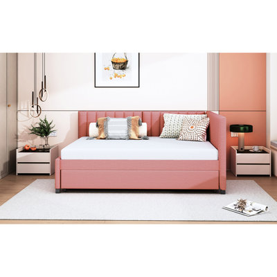 Lit de jour rembourré en tissu rose avec couchette et sans sommier polyvalent -