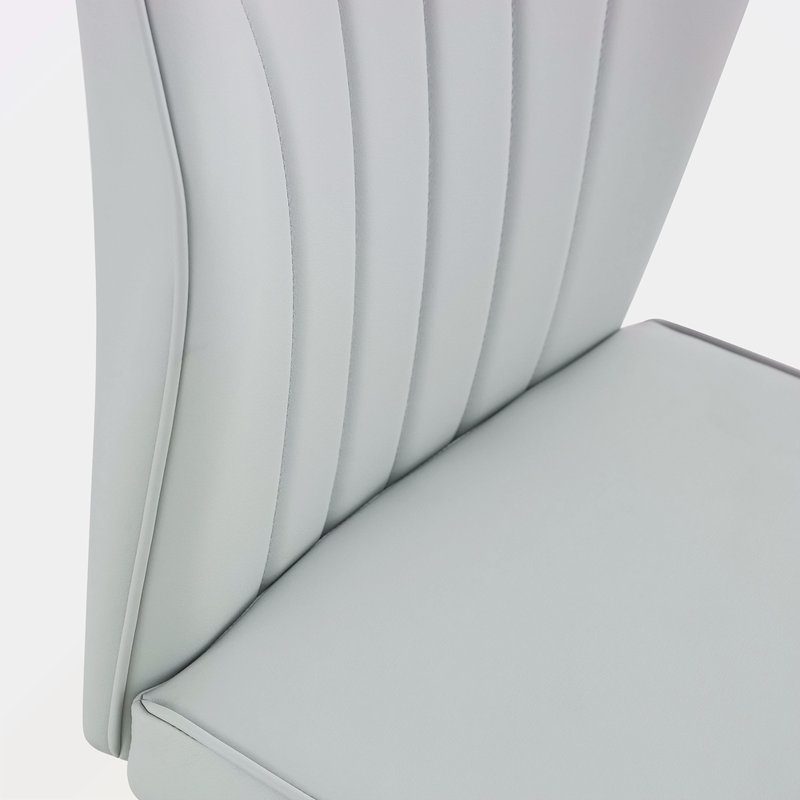 8 chaises de salle à manger modernes avec un élégant dossier à motif en polyuréthane et des pieds en métal pour une expérience confortable à la maison dans la cuisine, la chambre à coucher et le bureau.
