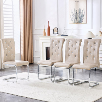 Ensemble de 4 chaises de salle à manger en peau d'alligator rétro avec boucles en cristal et pieds en métal galvanisé pour une assise élégante.