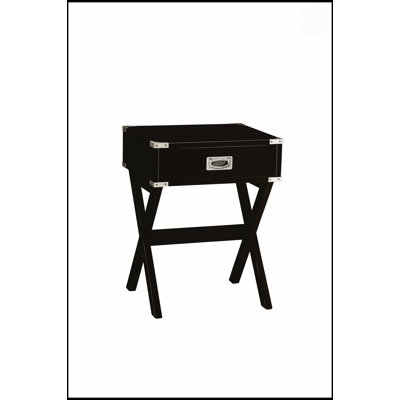 Table d'appoint Babs à finition noire avec tiroir, combinant une conception élégante et un rangement polyvalent pour tout espace de vie.