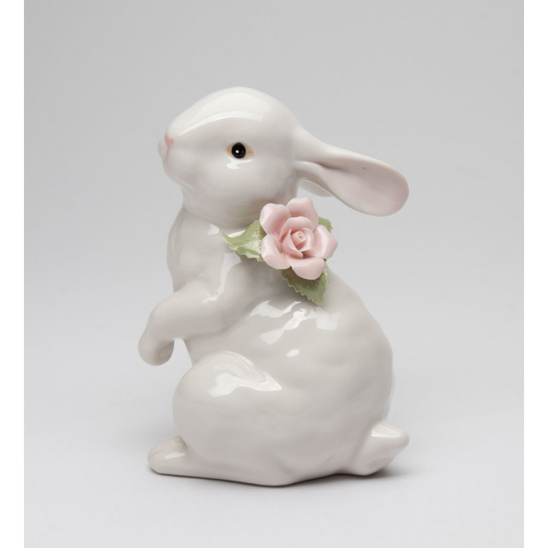 Lapin avec une rose rose - debout