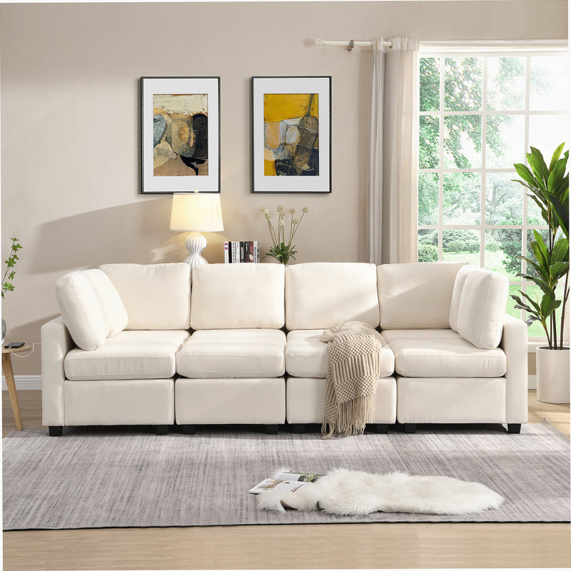 Canapé beige en chenille à accoudoirs carrés