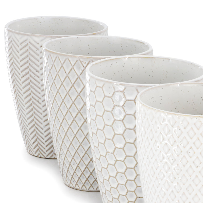 Gibson Elite Earlhart 4 Piece 16 Ounce Stoneware Assorted Pattern Mug Set in White
