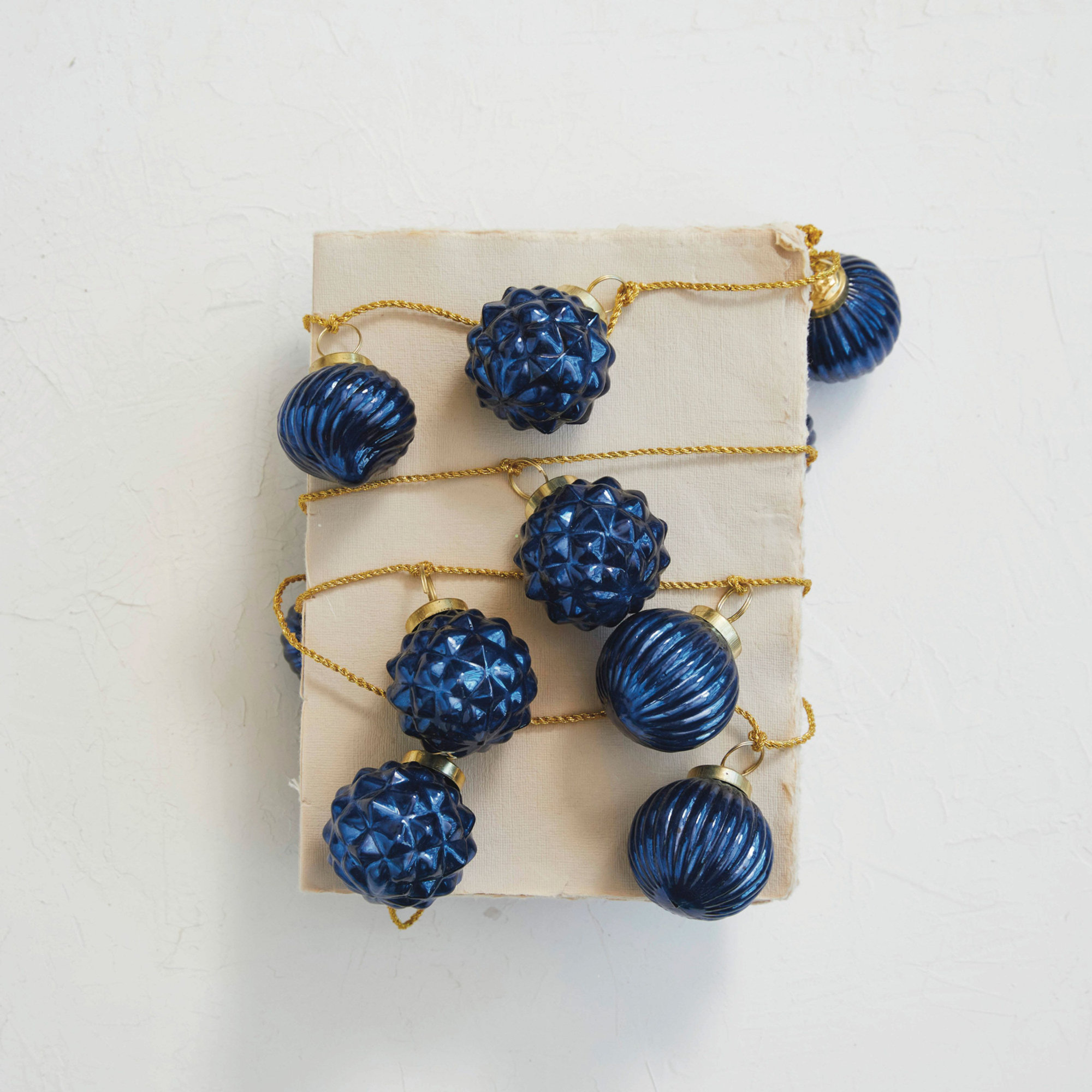 Embossed Mercury Glass Ornament Garland With Gold Cord, Blue