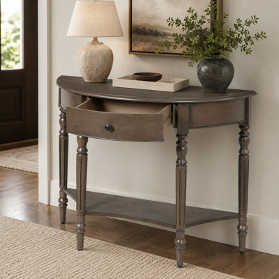 Console semi-circulaire rustique couleur noyer, dotée de tiroirs et d'une tablette de rangement ; suffisamment polyvalente pour servir de table d'appoint ou d'élément décoratif dans les entrées, les salons et les couloirs.