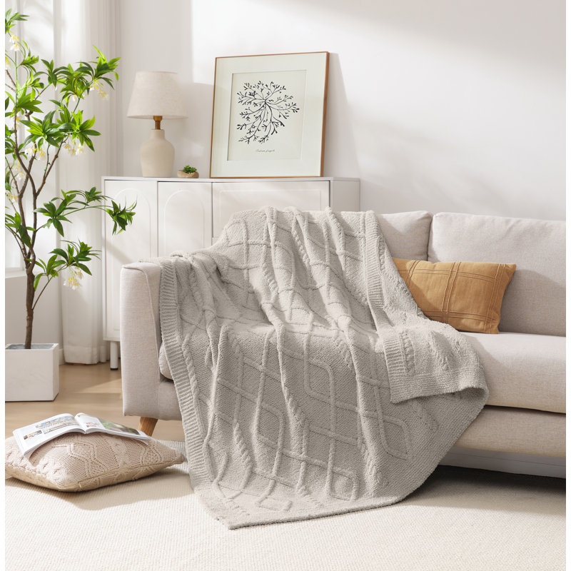 Jeté en plumes - Motif à losanges, Gris clair