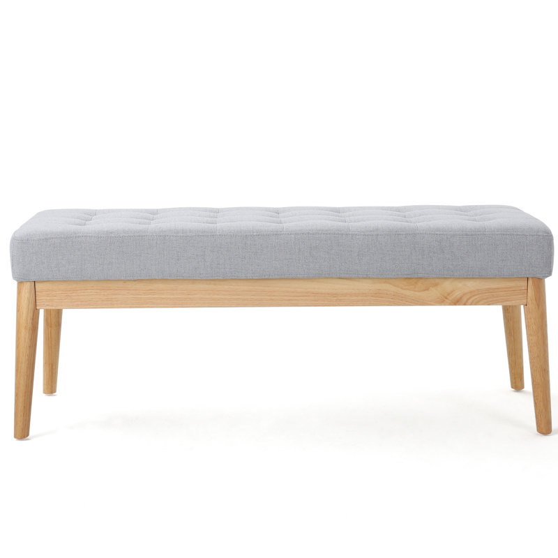 Moderne en gris avec coussin et pieds de banc en bouleau massif pour un salon confortable
