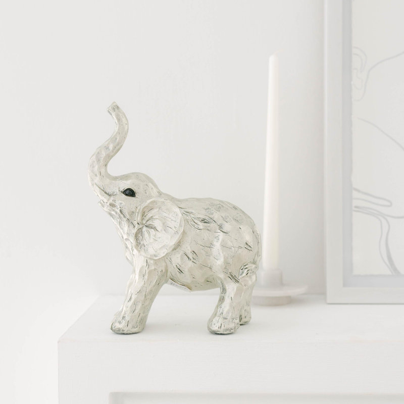 Figurine éléphant blanc avec tronc surélevé