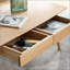 Table basse en chêne massif avec deux tiroirs et tablette de rangement