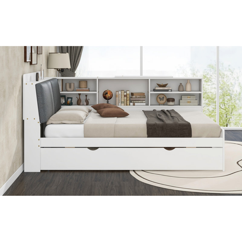 Lit plateforme en bois pleine grandeur blanc avec lit gigogne, tête de lit avec rangement et tablettes simples et élégantes