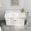 Meuble-lavabo simple Barnhart 48 po entièrement assemblé avec comptoir en pierre reconstituée, lavabo en céramique, peinture à la main, tiroirs à fermeture amortie sous le meuble et charnières de porte à fermeture amortie, dosseret inclus-107366404