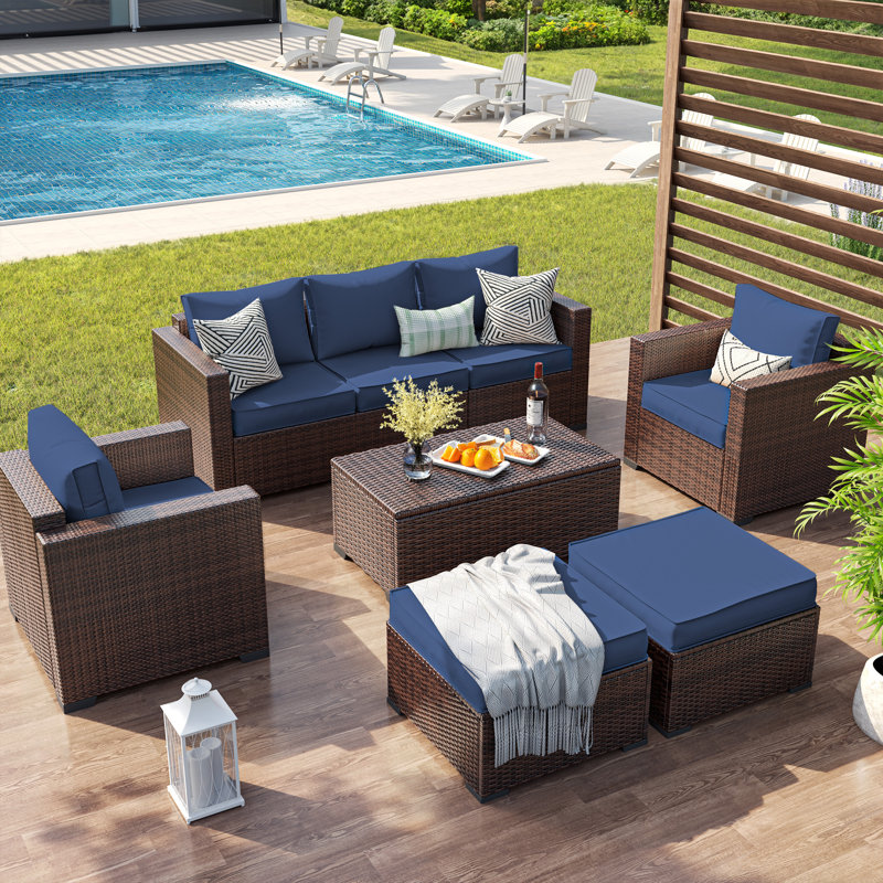 Ensemble de mobilier de jardin en résine tressée pour 5 personnes avec coffre de rangement et poufs, Bleu
