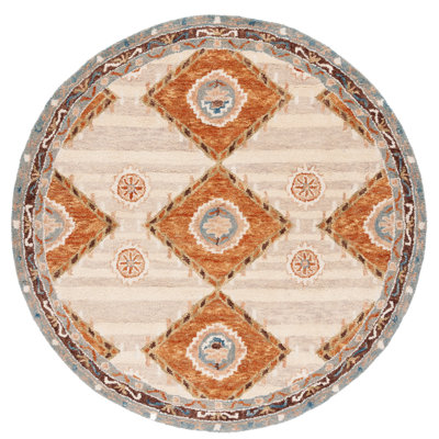 Arkadijus Southwestern Handmade Tufted Area Rug in Brown / Blue