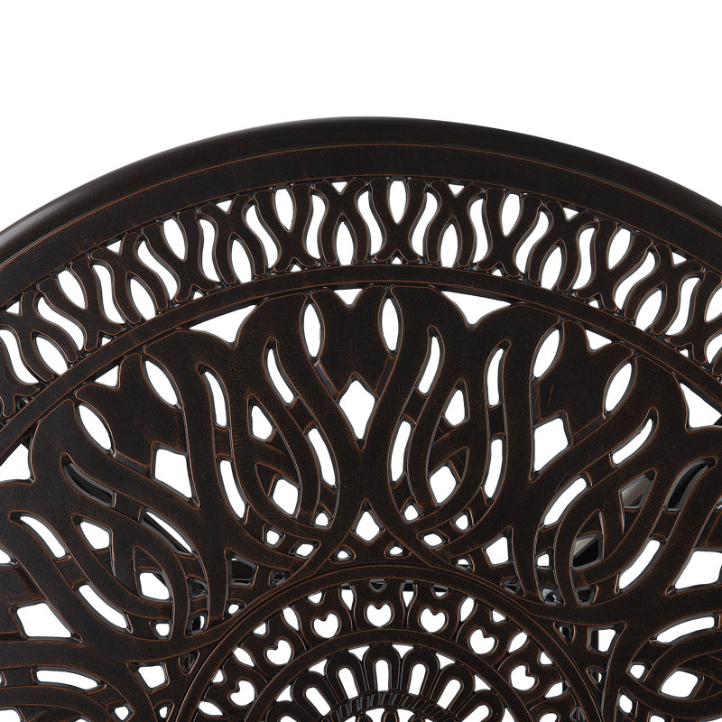 Aadhiran 4 - Person Patio Dining Set with Round Table , Cushions Included