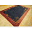 Tapis bleu antique en laine à motif oiseau minimaliste