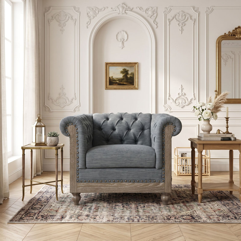 Fauteuil club capitonné