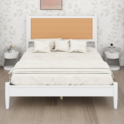 Platform bed frame with reinforced center support and boho coastal style