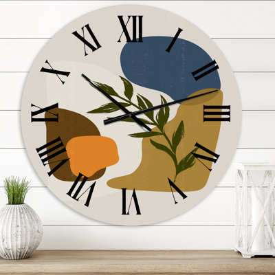 Horloge murale moderne à formes botaniques minimalistes avec feuille verte