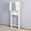 Armoire de rangement en bois au-dessus de la toilette
