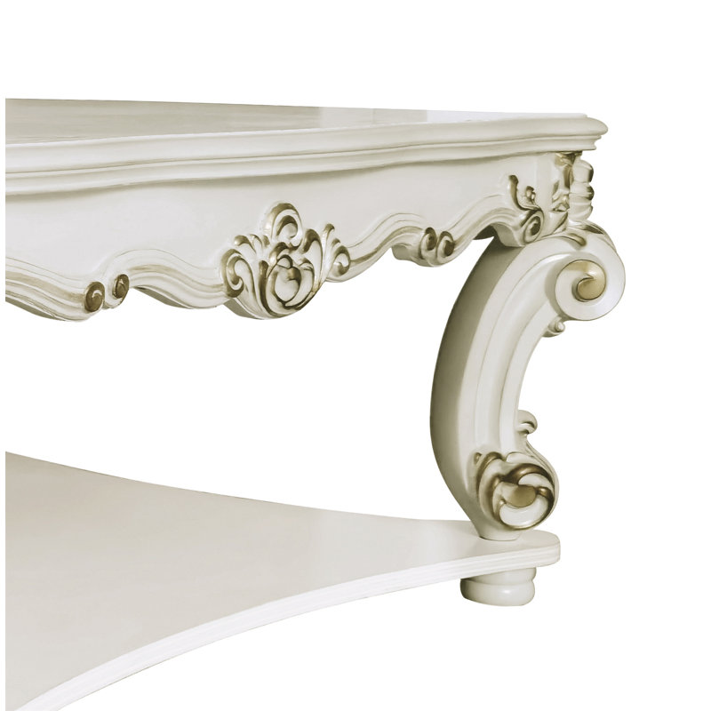 Table basse carrée Kelvin avec pieds à volutes et tablette inférieure