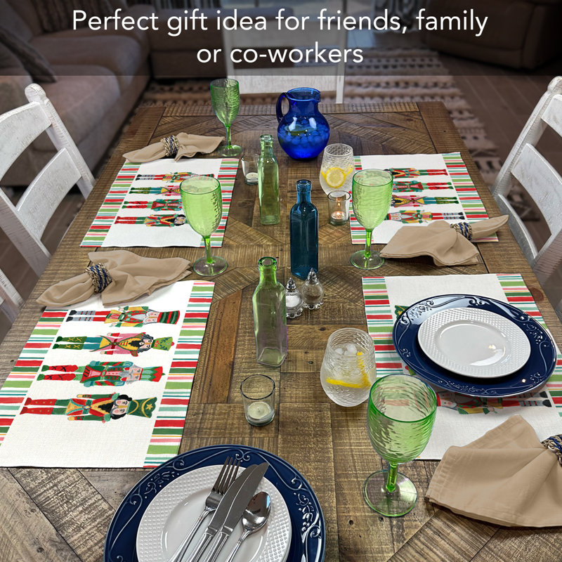 The Holiday Aisle® Nutcrackers 4-Pack Cotton Blend Rectangular Placemats