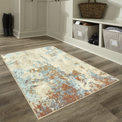 Tapis touffeté ivoire / brun