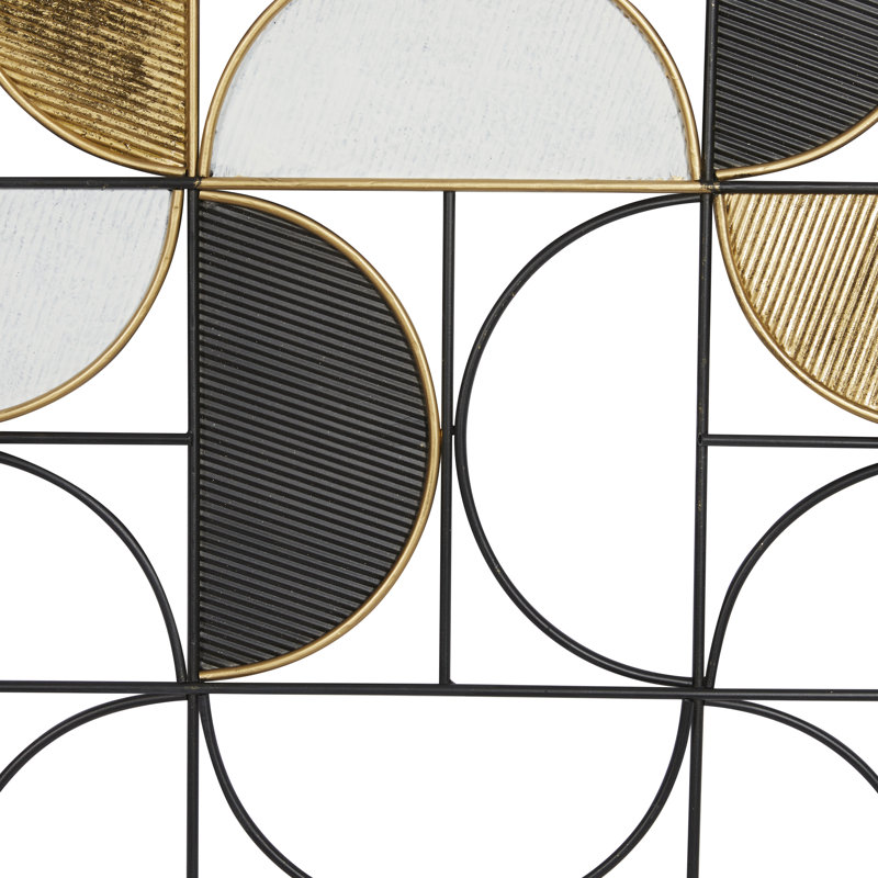 Décoration murale géométrique noire en métal avec détails dorés