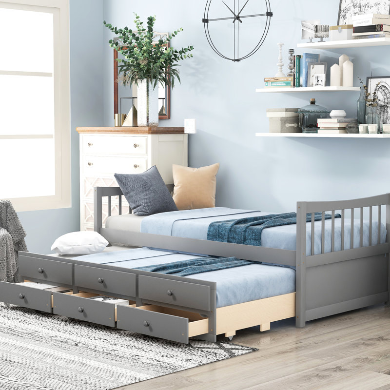 Lit de jour gris simple avec couchette et tiroirs pour un décor de bureau moderne