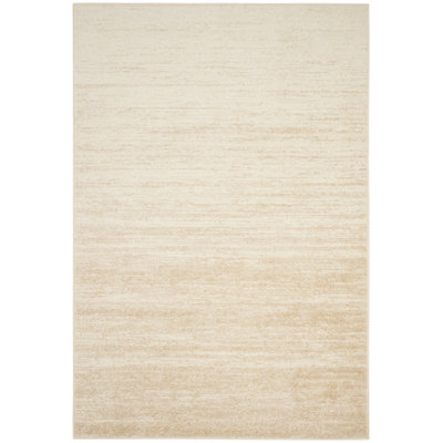 Tapis champagne et crème Bethlyn