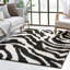 Tapis à motif imprimé animal noir Dondre-57430700