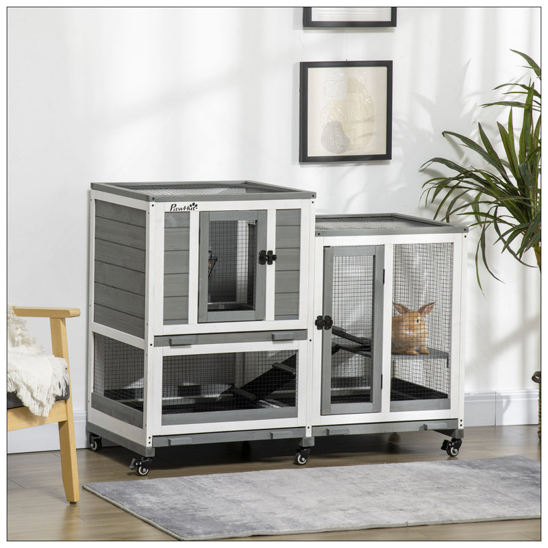 Cage à lapins d'intérieur à trois étages avec coulisses, roues, toit imperméable et plateaux amovibles pour un nettoyage et une mobilité faciles