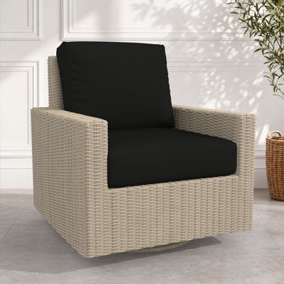 Chaise pivotante d'extérieur en osier avec coussins Sunbrella Hayes